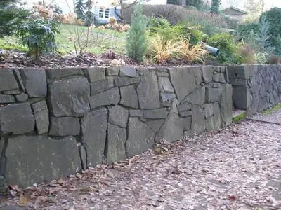 Black Basalt Wall...(mason unknown)