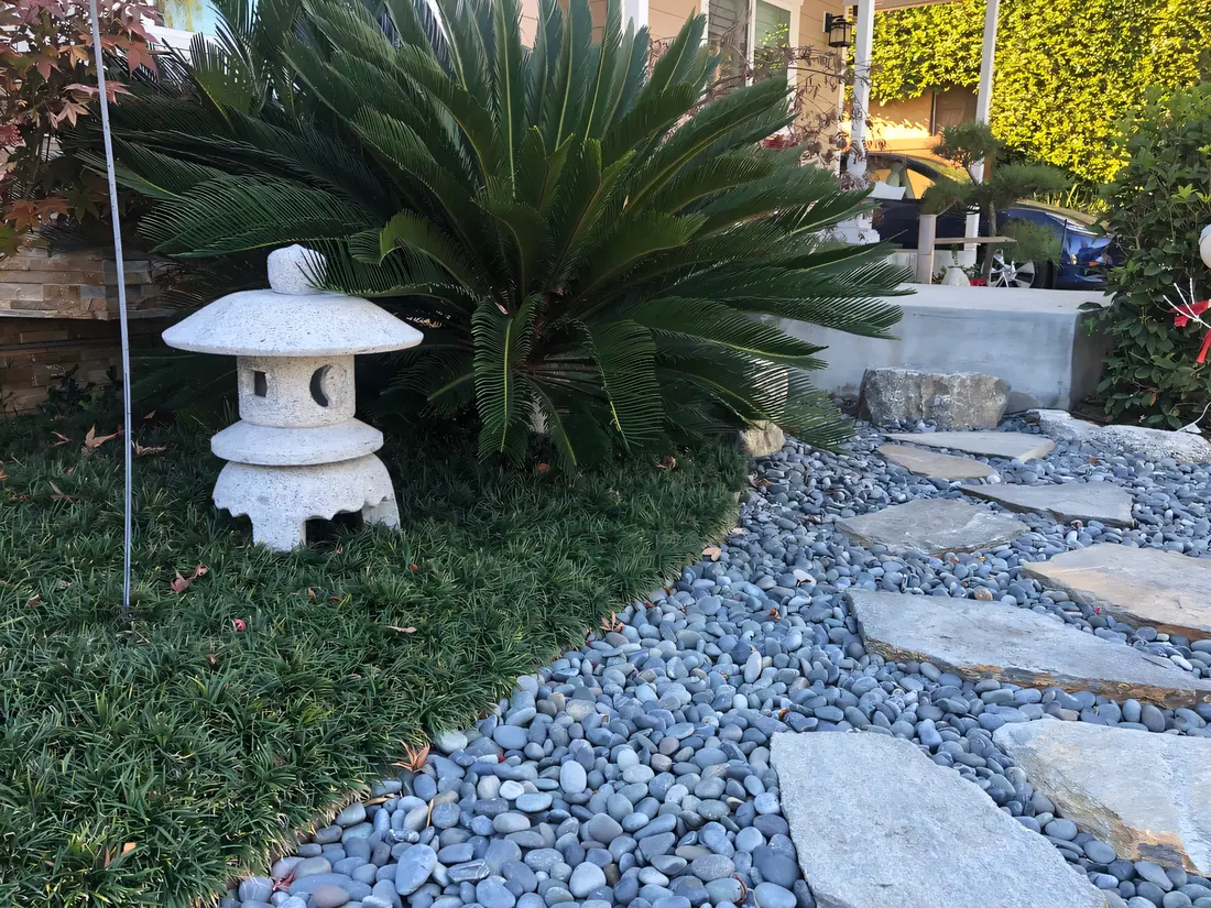Kodai Maru Yukimi granite lantern in a customer's garden